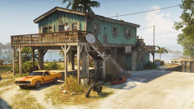 Jason's safehouse, a stilt house with his vehicles outside