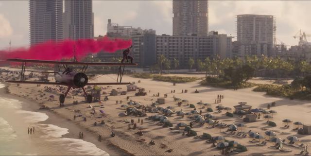 A wing walker over the beach. Still from official footage, Rockstar Games