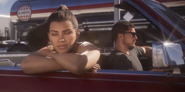 Jason and Lucia's convertible, a Globe Oil tanker behind. Still from official footage, Rockstar Games