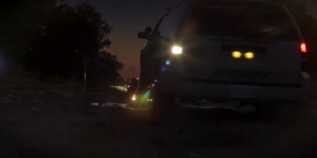 A Sheriff truck at dusk. Still from official footage, Rockstar Games