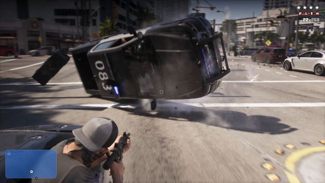A police cruiser flipping. Still from official footage, Rockstar Games