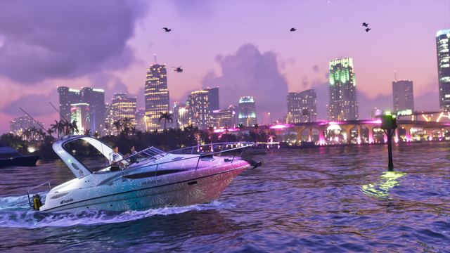 The Shitzu Squalo crossing the water at dusk with the city behind