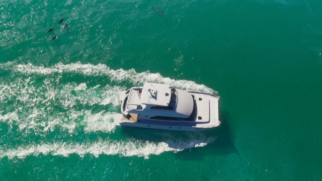 Motor yacht off the coast. Still from official footage, Rockstar Games