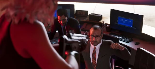 Bank staff at gunpoint. Still from official footage, Rockstar Games