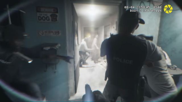 A police bodycam raid. Still from official footage, Rockstar Games