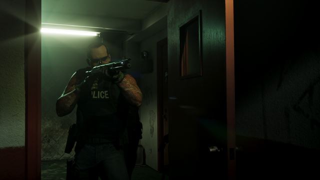 Police officer with a shotgun. Still from official footage, Rockstar Games