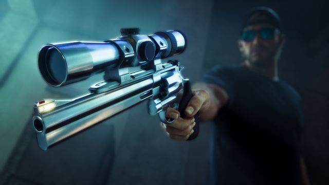 A scoped revolver aimed forward